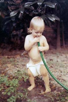 1970 Charles drinking from hose